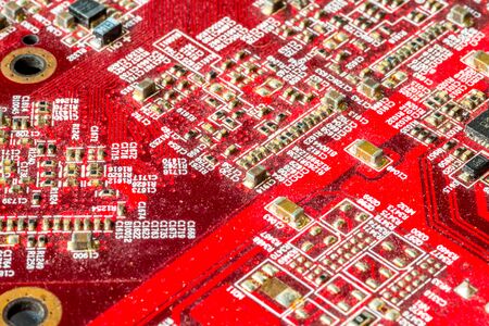 Red printed curcuit board PCB for computer components with electronic elementsの写真素材