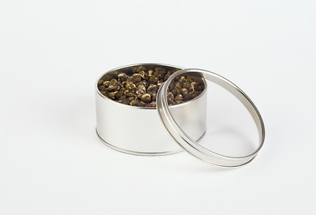 Jasmine Tea Leaves in metal tin.の写真素材