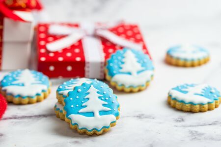 Close up of gingerbread cookies with christmas tree image on marble backgroundの写真素材