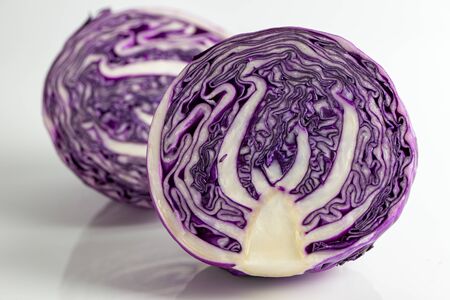 Close up of two halves red cabbage on white backgroundの写真素材