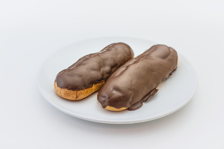 Eclair topped with chocolateの写真素材