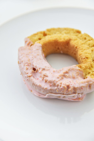 Twisted strawberry flavor doughnutの写真素材