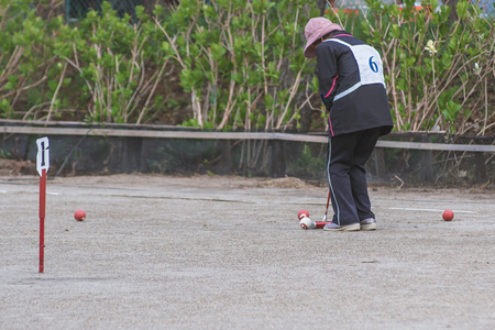 Elderly people enjoying gateballの写真素材