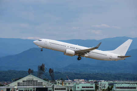 The passenger plane which takes offの写真素材