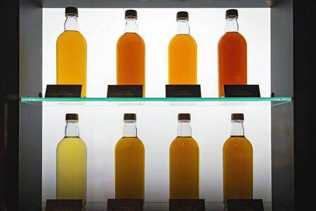 Unprocessed bottle whisky in cabinetの写真素材