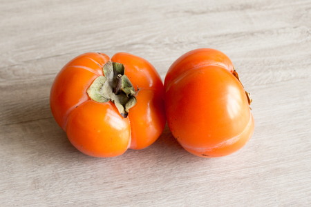 Fresh ripe persimmon, persimmon. Vitamins in the winterの写真素材