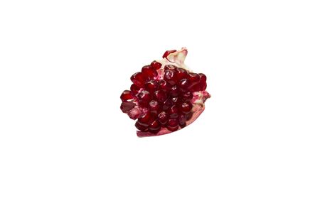 Slice ripe pomegranate isolate background.の写真素材