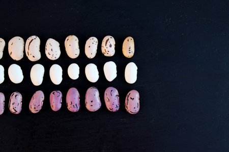 Bean. Three types of beans are neatly arranged in a row against a black background. Cereal healthy food conceptの写真素材