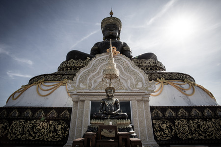 Black Buddha statue in plublic Temple Thailandの写真素材