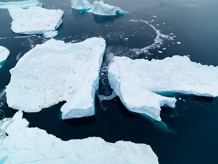 Aerial view icebergs on arctic ocean