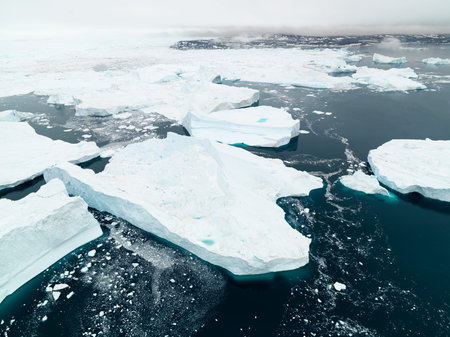 Aerial view icebergs on arctic ocean