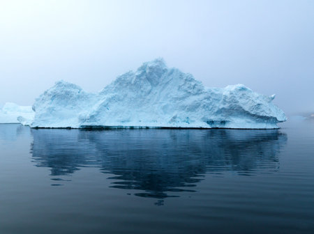 Arctic iceberg in a foggy day