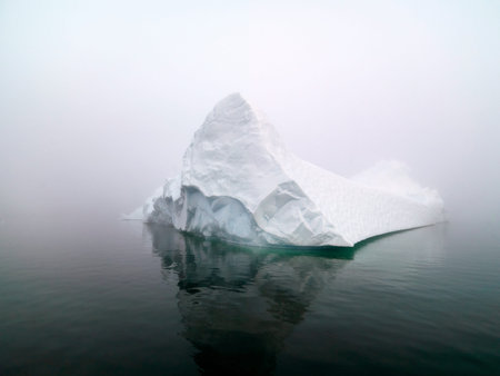 Arctic iceberg in a foggy day