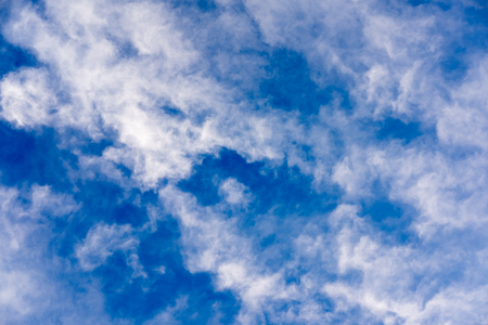 Blue sky with cloudsの写真素材