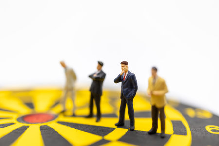 Business, Planning, Succession and Management Concept. Close up of group of businessman miniature...