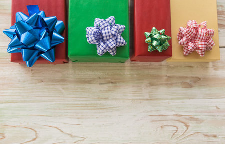 New Year, Christmas and Holiday Seasoning concept. Close up of colorful four gift box with beautiful...