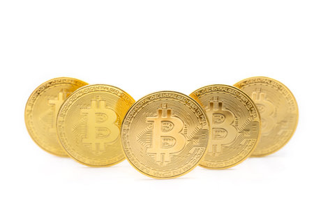 Business , Money, Technology and  cryptocurrency Concept. Closeup of 5 gold bitcoin coins isolated...