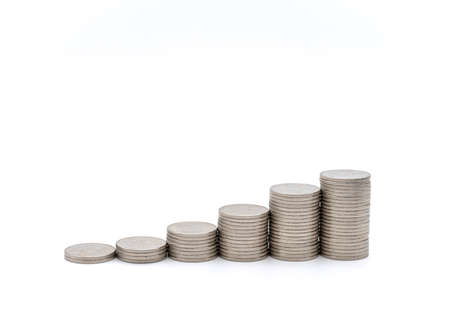 Money and Financial Concept. Closeup of stack of silver coins on white background.の写真素材