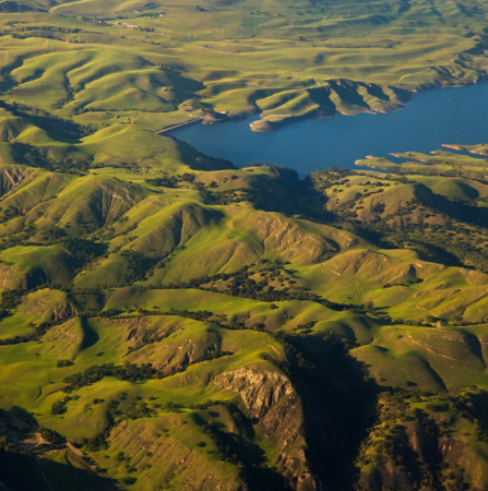 Beautiful verdant pastoral hillsides of California, as seen from aboveの写真素材
