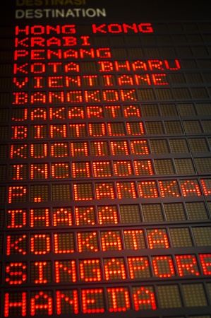 airport departures board that shows asian destinations.の写真素材