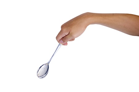 man hand holding a spoon, isolated with clipping path in jpg.の写真素材