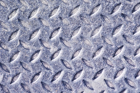 a detailed shot of diamond plate, for grunge background.の写真素材