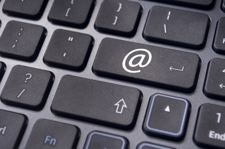 at sign or ampersat on keyboard enter key, for email concepts の写真素材