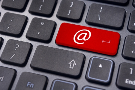 at sign or ampersat on keyboard enter key, for email concepts の写真素材