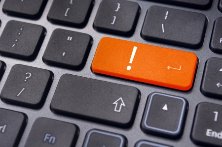 concepts of computer system errors or warnings, with an exclamation mark on it.の写真素材