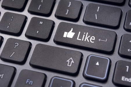 A like message on enter keyboard for social media concepts.の写真素材