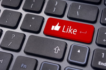 A like message on enter keyboard for social media concepts.の写真素材