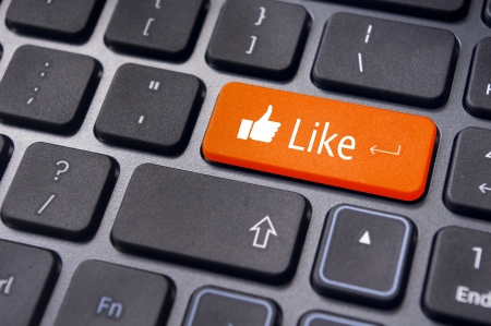 A like message on enter keyboard for social media concepts.の写真素材