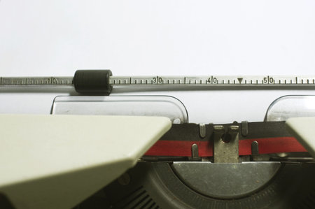 a close up of typewriter, focus on paper where message will be typed 