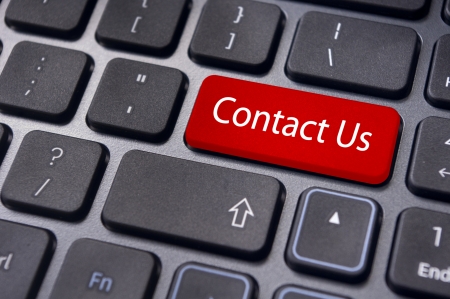 A contact us message on enter key of keyboard, for online communications.の写真素材