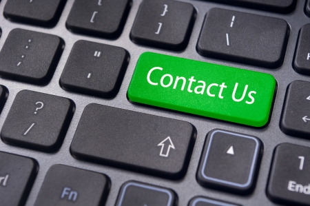 A contact us message on enter key of keyboard, for online communications.の写真素材