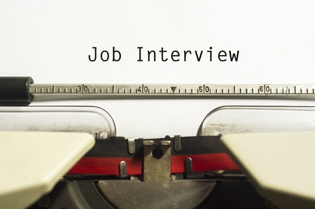 concept of job interview, with message on typewriter.の写真素材