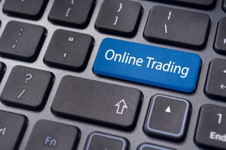 keyboard enter key with message, for online or internet trading concepts.の写真素材