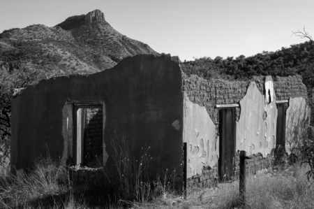 Crumbling old adobe building and Montana Peak, Ruby, Arizonaの写真素材