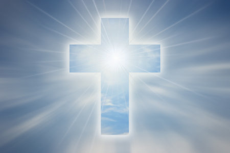 shining cross on blurred skyの写真素材