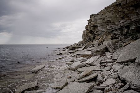 Cliffs on a Baltic sea shore in a stormy weatherの写真素材