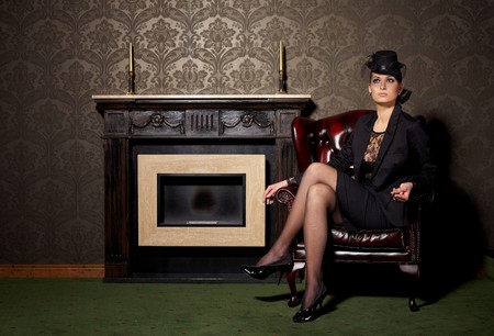Glamorous brunette woman in vintage interiorの写真素材