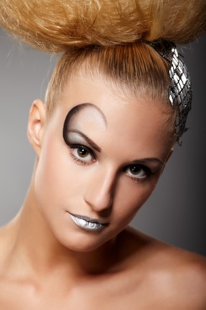 Closeup portrait of a model with fashionable makeup and hairstyleの写真素材