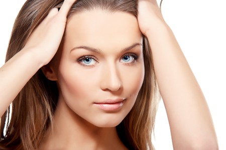 Portrait of beautiful lady with blue eyes isolated on whiteの写真素材