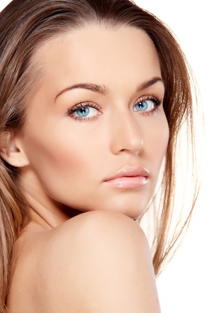 Portrait of beautiful lady with blue eyes isolated on whiteの写真素材