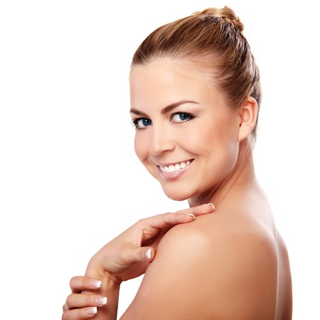 Closeup portrait of beautiful female model on white backgroundの写真素材
