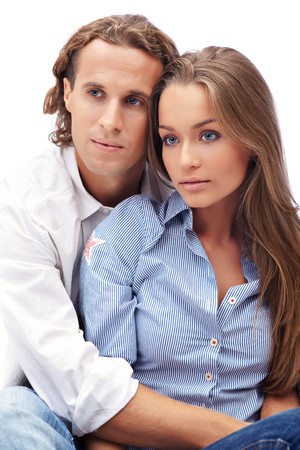 Happy young couple isolated on whiteの写真素材