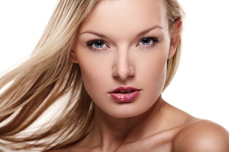 Portrait of beautiful female model on white backgroundの写真素材