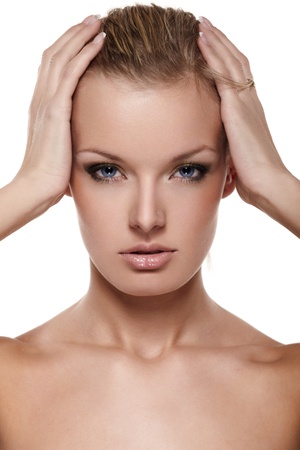 Portrait of beautiful female model on white backgroundの写真素材
