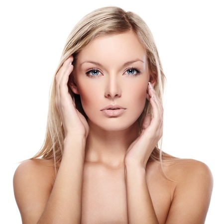 Portrait of beautiful female model on white backgroundの写真素材