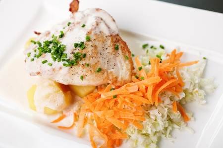 Chicken Stuffed with cream cheese, tomato, carrot and cabbage saladの写真素材
